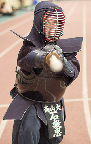 A Knox College student at International Fair